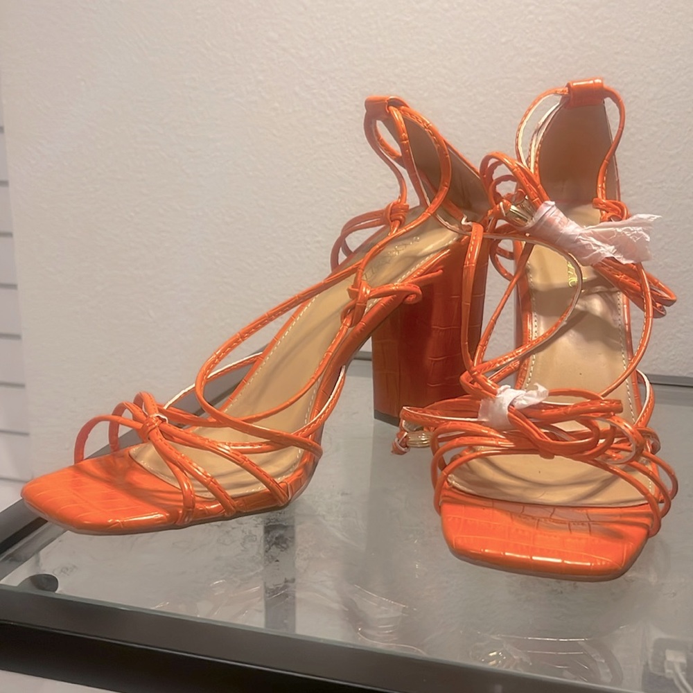 Never been worn! Orange gladiator sandals, size US 9.5